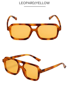 Detail of leopard print double bridge sunglasses with yellow lenses in multiple views