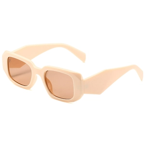 Chic cream rectangle sunglasses with angular cut frames and brown lenses shown at 45-degree