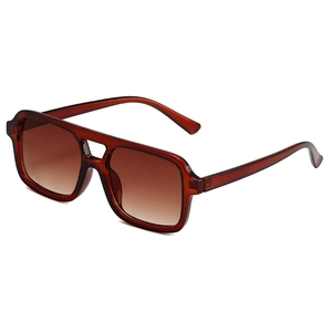 Classic aviator sunglasses with brown transparent frames and gradient tea lenses