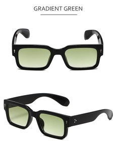 Vue détaillée de la monture carrée noire et des verres dégradés verts des lunettes