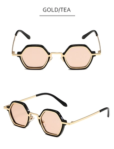 Detailed front and side views of gold metal and black hexagonal frame sunglasses