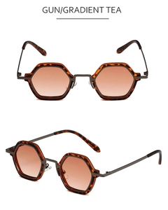 Detail of hexagonal tortoise frame with gunmetal legs and gradient tea lenses