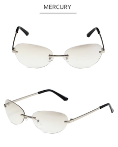 Detail of Y2K rimless oval sunglasses with light brown gradient lenses and silver metal frame