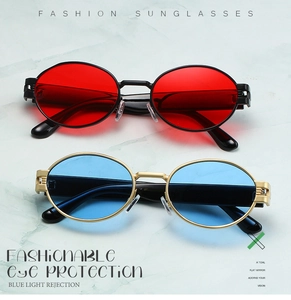 Détail de lunettes de soleil ovales en métal vintage avec verres rouges et bleus steampunk
