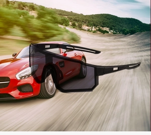 Detail of sleek black cycling sunglasses with large shield lens and sporty cutout temples