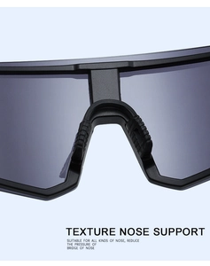 Macro detail of anti-slip textured rubber nose pads on matte cycling sunglasses