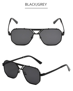 Detail view of black metal double-bridge aviator sunglasses with dark grey polarized lenses
