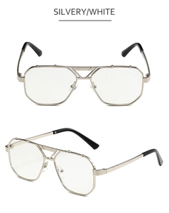 Close-up of silver aviator sunglasses featuring double bridge and polygon metal frame