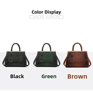 Three trapezoid faux leather handbags with crocodile texture in black, green, and brown