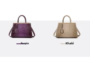 Detail view of crocodile pattern handbags in purple and khaki colors with metal charms