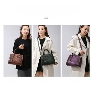Crocodile pattern tote bags in brown, green, and purple with versatile carrying options