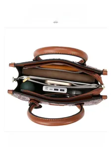 Top view of large capacity brown crocodile tote bag interior showing spacious storage