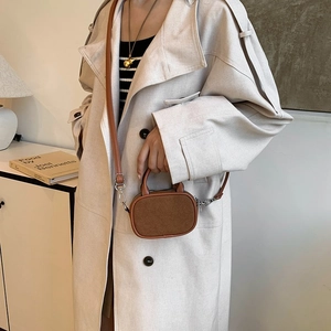 Brown small crossbody handbag with contrast stitching and metal clasp for women