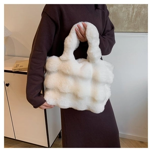 Winter plush checkered underarm bag in bright white faux fur with quilted texture