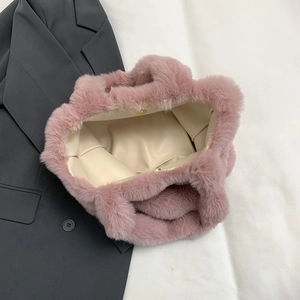 Plush pink checkered faux fur tote bag with internal magnetic closure and satin lining