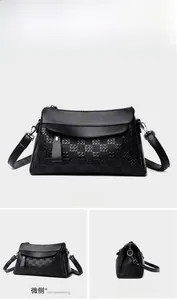 Detailed views showing black quilted faux leather crossbody bag with adjustable silver buckle