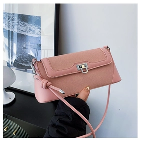 Detail of pink PU leather underarm bag featuring woven texture flap and silver metal lock