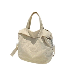 Schicker beiger Canvas-Shopper mit verstellbarem Riemen und Griffen für den Alltag