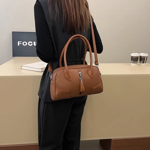 Brown lychee leather boston bag for women with silver hardware and shoulder strap