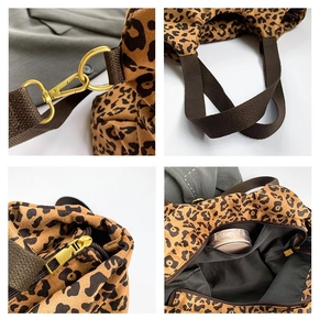 Detail of leopard print handbag showing golden hardware and spacious interior pocket