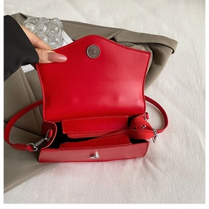 Elegant bright red flap shoulder bag with silver hardware and interior zipper pocket