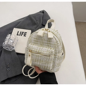 Mini zaino in tweed da donna con trama intrecciata dorata e manico in pelle