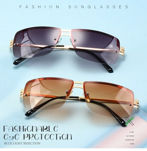 Detail of rimless square sunglasses with gold metal bridge and blue light blocking lenses