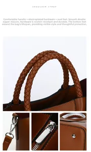 Detail view of brown PU leather bag with woven handle, silver hardware and protective feet