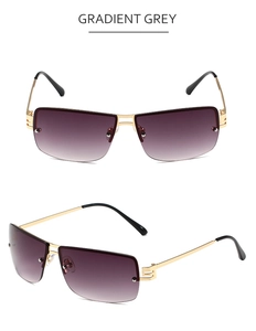 Detail of rimless square sunglasses with gradient grey lenses and golden hollow temples