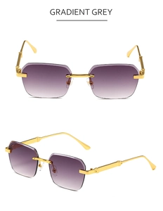 Detail view of rimless square sunglasses featuring gradient grey lenses and gold metal temples