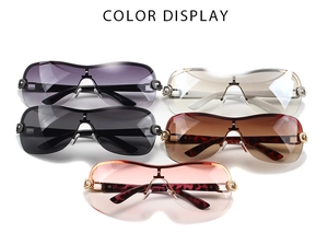 Color display of five oversized rimless Y2K sunglasses with textured metal hinges