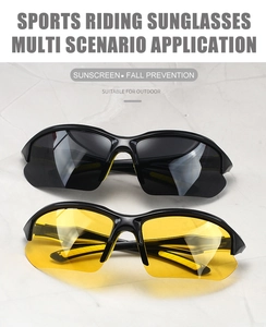 Detail of polarized cycling sunglasses with black and yellow night vision lenses for outdoor