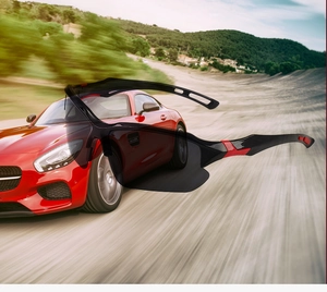 Close-up of polarized sports sunglasses with red anti-slip grips and black aerodynamic frame
