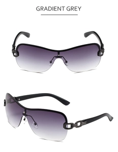 Detail of gradient grey Y2K wrap sunglasses with stylish metallic chain hinges
