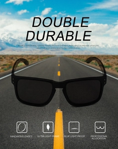 Polarized sunglasses with black square frames on a desert road showing durability