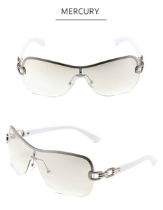 Close-up of Y2K rimless sunglasses with silver chain metal trim and white temples