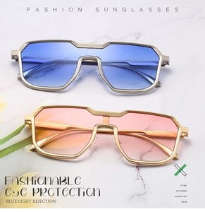 Detail of blue and orange gradient steampunk sunglasses with dual metal bridge frames