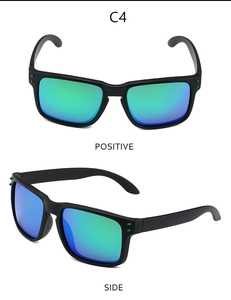 Front and side views of matte black polarized sports sunglasses with green mirror lenses