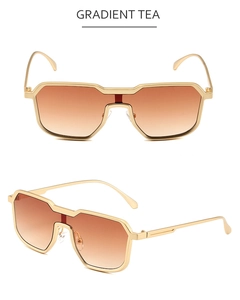 Detail view of steampunk gradient tea lenses with a gold metal double bridge frame