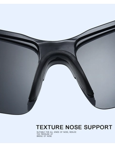 Macro detail of textured anti-slip nose pads on polarized cycling sports sunglasses