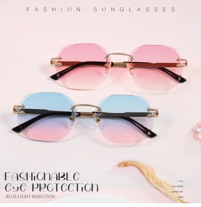 Detail of snake-style rimless sunglasses showing golden metal temples and blue light filter