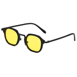 Retro small frame sunglasses with black metal frame and yellow lenses for a vintage look