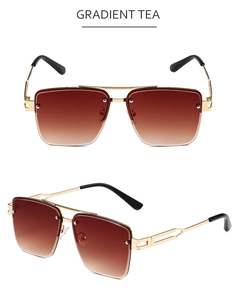 Detail of square gradient tea lenses and golden hollow metal temples on sunglasses