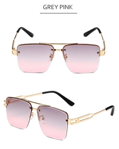 Detail of square sunglasses with grey pink gradient lenses and gold hollow temples