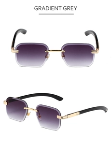 Détail de lunettes de soleil sans monture carrées avec verres dégradés gris et cadre doré