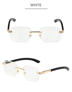 Détail de lunettes de soleil carrées sans monture avec cadre doré et verres transparents