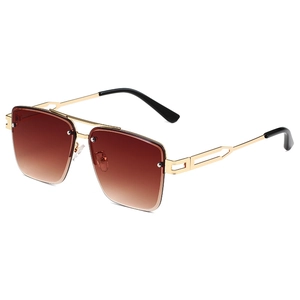 Fashion square metal sunglasses with brown gradient lenses and gold frames in 45-degree view