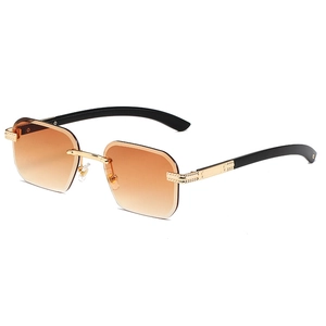 Lunettes de soleil carrées sans monture avec verres dégradés orange et branches dorées