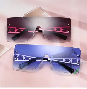 Close-up of oversized rimless star sunglasses with blue and purple gradient lenses