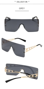 Detail of grey gradient frameless sunglasses with gold metal star cutout temple